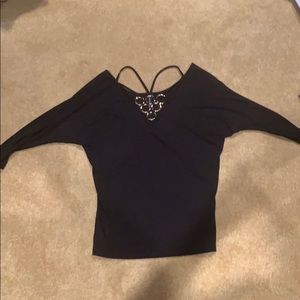 Black Marciano top with gold accents